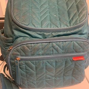 Skip hop diaper bag in teal.  Used but still in good condition.